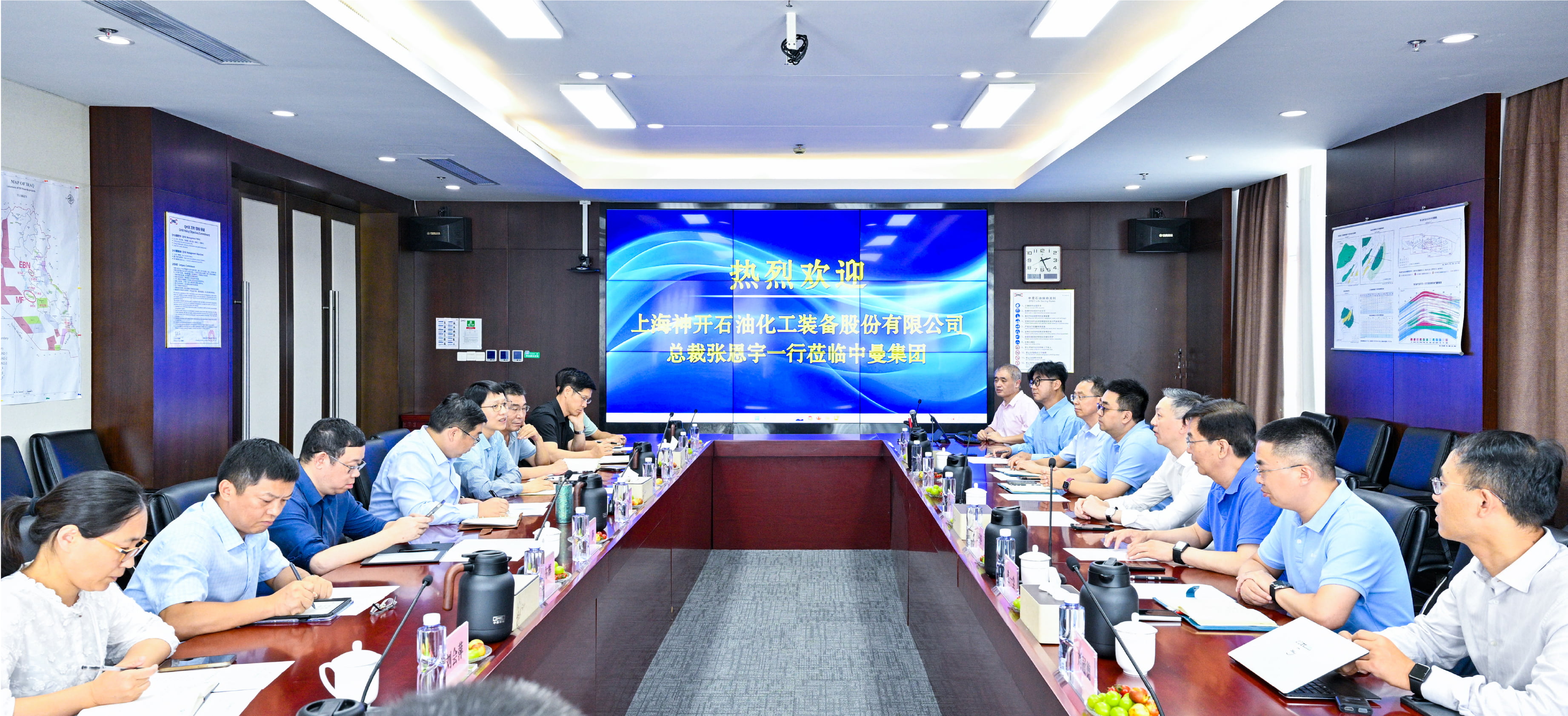 js1996官网股份总裁一行赴中曼石油互换(图1)
